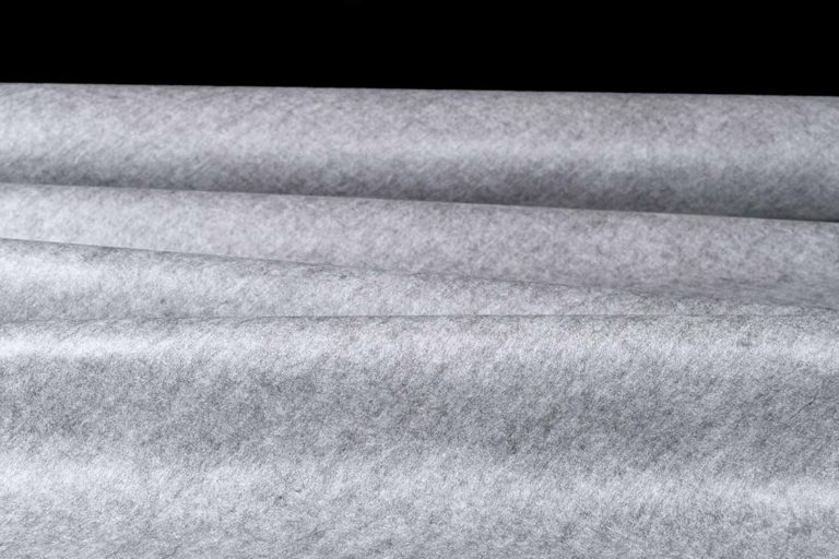 Acoustic fabric 75, Gray Color. Density: 55 g/m2. Width: 130 cm. Roll length: 100 m.